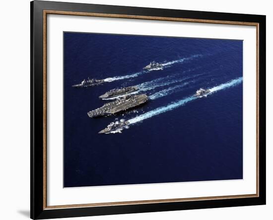 The Abraham Lincoln Carrier Strike Group Ships Cruise in Formation in the Pacific Ocean-Stocktrek Images-Framed Photographic Print