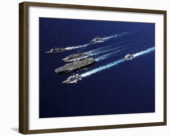 The Abraham Lincoln Carrier Strike Group Ships Cruise in Formation in the Pacific Ocean-Stocktrek Images-Framed Photographic Print