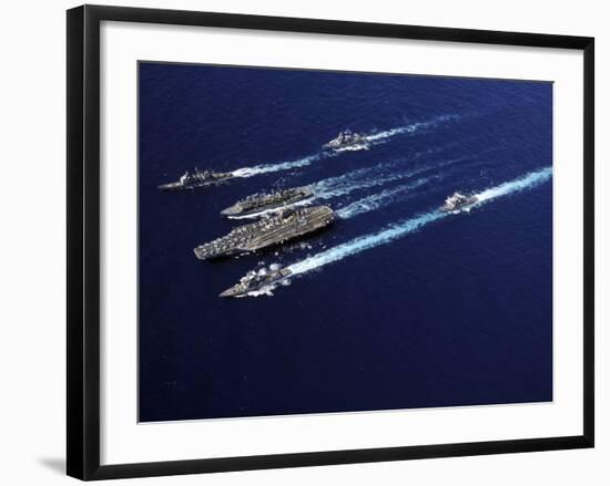The Abraham Lincoln Carrier Strike Group Ships Cruise in Formation in the Pacific Ocean-Stocktrek Images-Framed Photographic Print