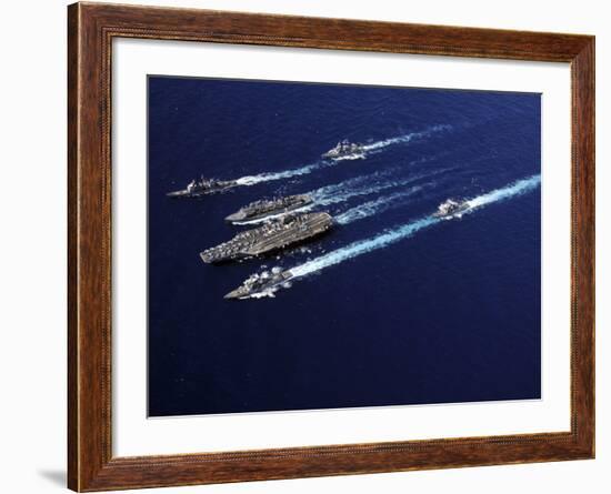 The Abraham Lincoln Carrier Strike Group Ships Cruise in Formation in the Pacific Ocean-Stocktrek Images-Framed Photographic Print