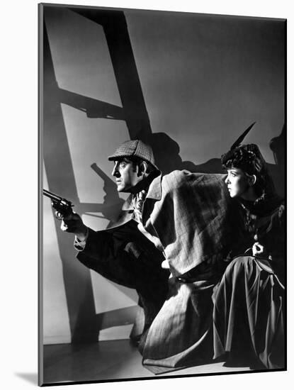 THE ADVENTURES OF SHERLOCK HOLMES, 1939 directed by ALFRED WERKER Basil Rathbone and Ida Lupino (b/-null-Mounted Photo