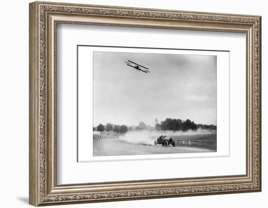 The Airplane Races the Automobile-null-Framed Photo