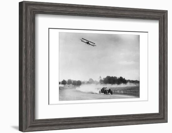 The Airplane Races the Automobile-null-Framed Photo