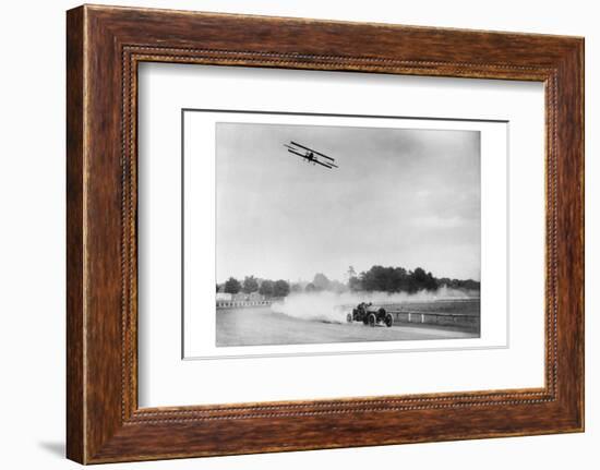 The Airplane Races the Automobile-null-Framed Photo