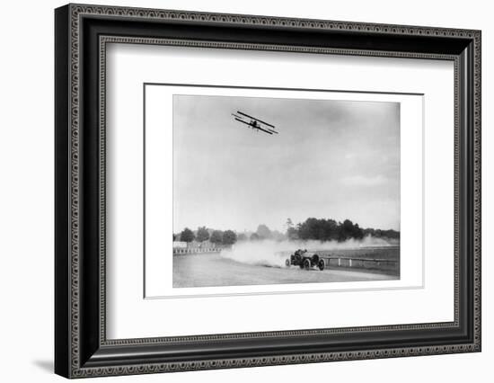 The Airplane Races the Automobile-null-Framed Photo