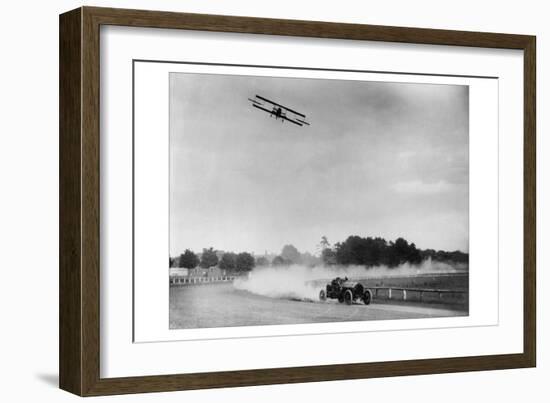 The Airplane Races the Automobile-null-Framed Art Print