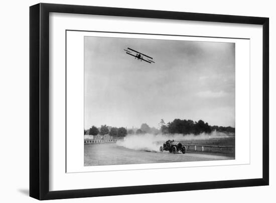 The Airplane Races the Automobile-null-Framed Art Print