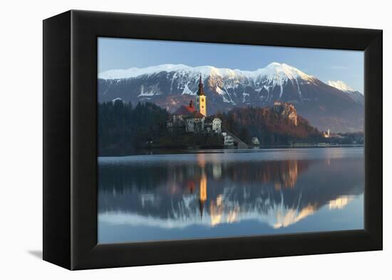 The Assumption of Mary Pilgrimage Church on Lake Bled and Bled Castle, Bled, Slovenia, Europe-Miles Ertman-Framed Premier Image Canvas