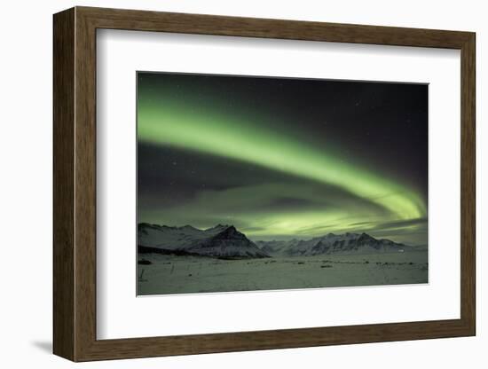 The Aurora Borealis in Iceland with Mountains in the Background-Alex Saberi-Framed Photographic Print