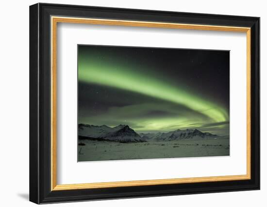 The Aurora Borealis in Iceland with Mountains in the Background-Alex Saberi-Framed Photographic Print