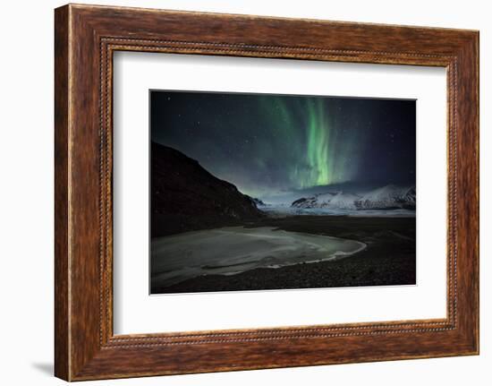 The Aurora Borealis over a Glacier in the Skaftafell National Park in Iceland-Alex Saberi-Framed Photographic Print