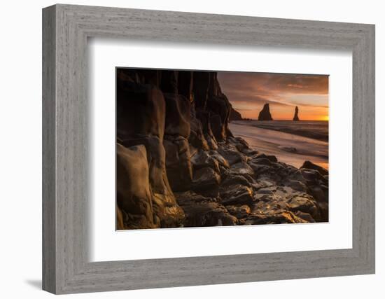 The basalt rock formations in the sea on Reynisfjara Beach in Vik, Iceland at sunrise.-Alex Saberi-Framed Photographic Print