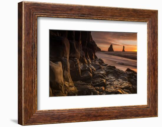 The basalt rock formations in the sea on Reynisfjara Beach in Vik, Iceland at sunrise.-Alex Saberi-Framed Photographic Print