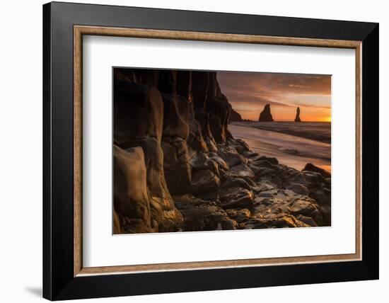 The basalt rock formations in the sea on Reynisfjara Beach in Vik, Iceland at sunrise.-Alex Saberi-Framed Photographic Print