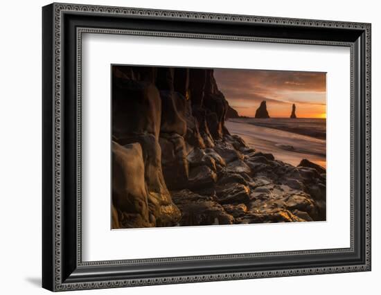 The basalt rock formations in the sea on Reynisfjara Beach in Vik, Iceland at sunrise.-Alex Saberi-Framed Photographic Print