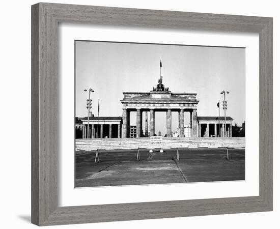 The Brandenburg Gate in East Berlin Behind the Berlin Wall-null-Framed Photo