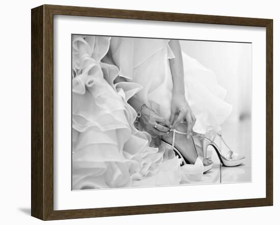 The Bride is Putting on Her Shoes for the Wedding Day-szefei-Framed Photographic Print