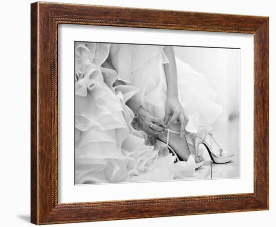 The Bride is Putting on Her Shoes for the Wedding Day-szefei-Framed Photographic Print