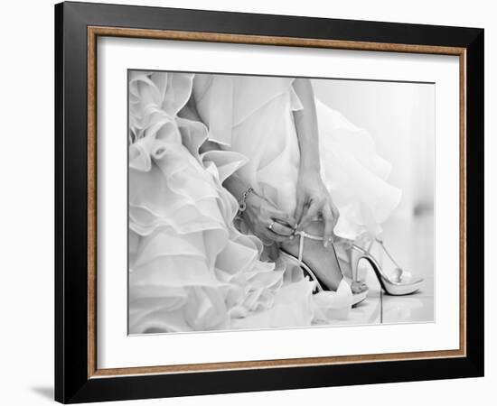 The Bride is Putting on Her Shoes for the Wedding Day-szefei-Framed Photographic Print