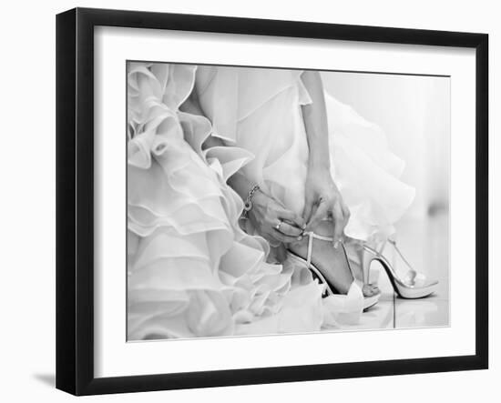 The Bride is Putting on Her Shoes for the Wedding Day-szefei-Framed Photographic Print