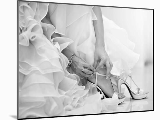 The Bride is Putting on Her Shoes for the Wedding Day-szefei-Mounted Photographic Print