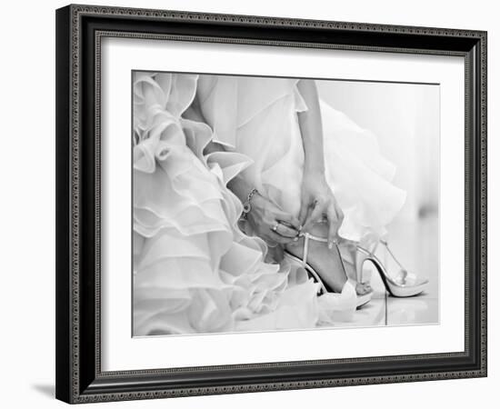 The Bride is Putting on Her Shoes for the Wedding Day-szefei-Framed Photographic Print