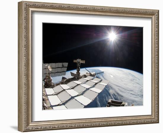 The Bright Sun, a Portion of the International Space Station And Earth's Horizon-Stocktrek Images-Framed Photographic Print