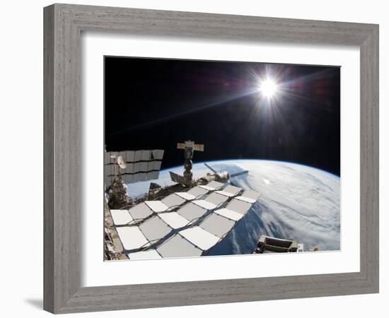 The Bright Sun, a Portion of the International Space Station And Earth's Horizon-Stocktrek Images-Framed Photographic Print