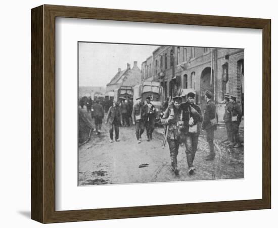 'The British wounded returning to a dressing station after an attack', 1915-Unknown-Framed Photographic Print