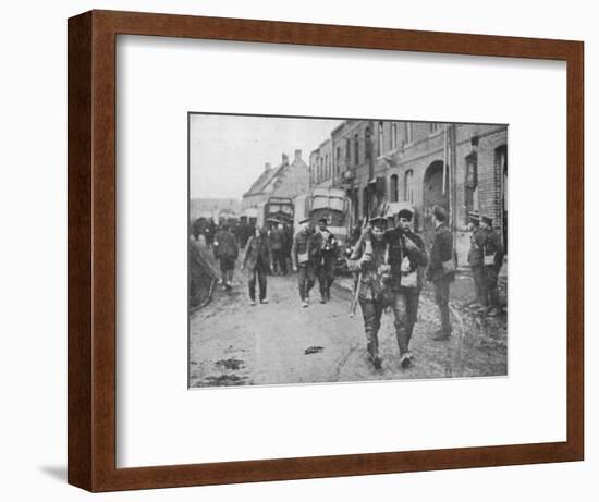'The British wounded returning to a dressing station after an attack', 1915-Unknown-Framed Photographic Print