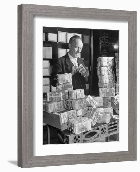 The Chief Cashier Counting Piles of Money-Walter Sanders-Framed Photographic Print