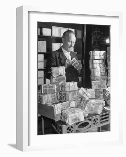 The Chief Cashier Counting Piles of Money-Walter Sanders-Framed Photographic Print