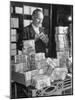 The Chief Cashier Counting Piles of Money-Walter Sanders-Mounted Photographic Print