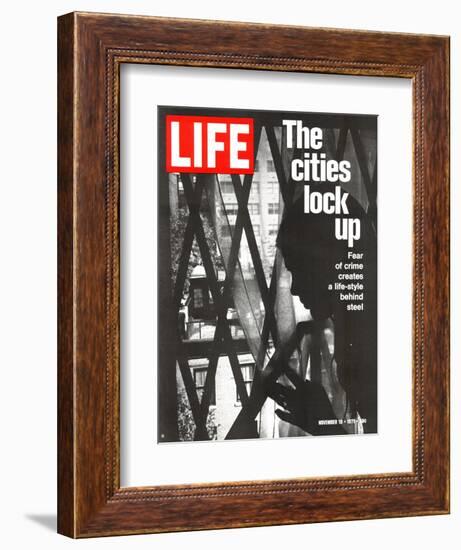 The Cities Lock Up, Woman at Gated Window, November 19, 1971-John Loengard-Framed Photographic Print