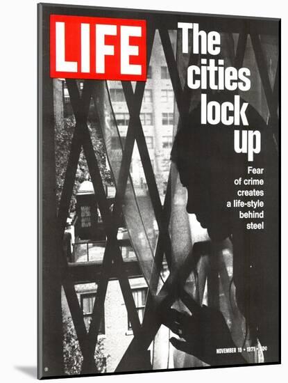 The Cities Lock Up, Woman at Gated Window, November 19, 1971-John Loengard-Mounted Photographic Print
