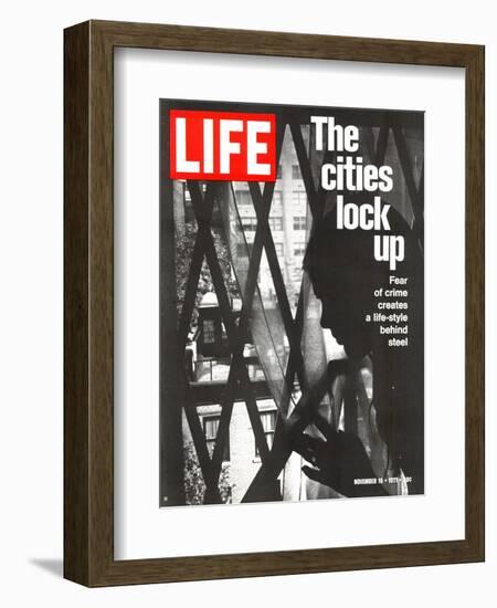 The Cities Lock Up, Woman at Gated Window, November 19, 1971-John Loengard-Framed Photographic Print