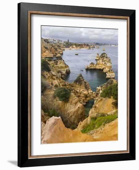 The cliffs and sea stacks of Ponta da Piedade, Algarve, Portugal.-Martin Zwick-Framed Photographic Print