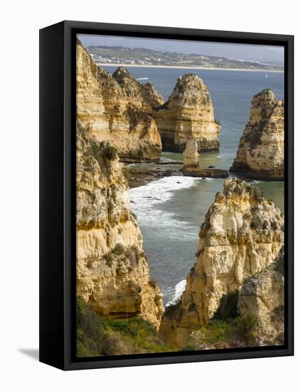 The cliffs and sea stacks of Ponta da Piedade, Algarve, Portugal.-Martin Zwick-Framed Premier Image Canvas