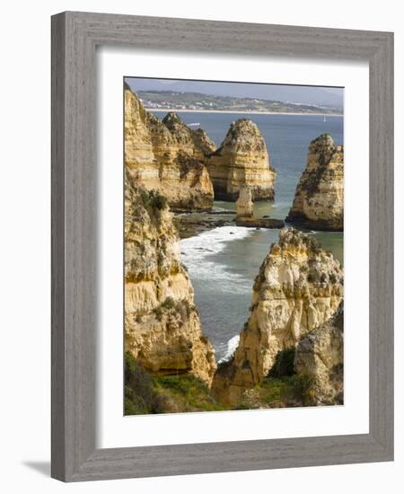 The cliffs and sea stacks of Ponta da Piedade, Algarve, Portugal.-Martin Zwick-Framed Photographic Print