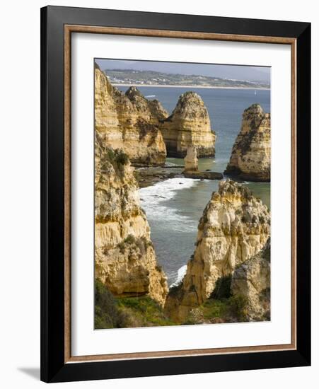 The cliffs and sea stacks of Ponta da Piedade, Algarve, Portugal.-Martin Zwick-Framed Photographic Print