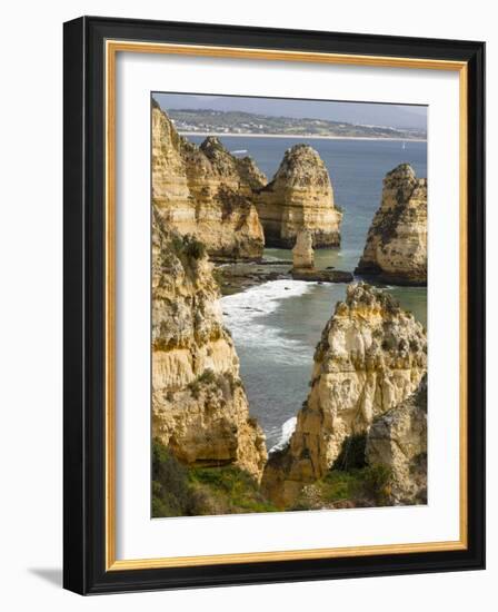 The cliffs and sea stacks of Ponta da Piedade, Algarve, Portugal.-Martin Zwick-Framed Photographic Print