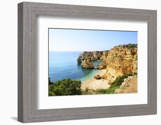 The coastal rock formations at Marinha beach (Praia da Marinha). Algarve, Portugal-Mauricio Abreu-Framed Photographic Print