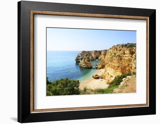 The coastal rock formations at Marinha beach (Praia da Marinha). Algarve, Portugal-Mauricio Abreu-Framed Photographic Print