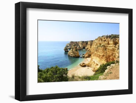 The coastal rock formations at Marinha beach (Praia da Marinha). Algarve, Portugal-Mauricio Abreu-Framed Photographic Print