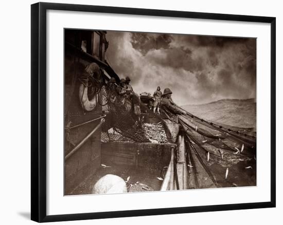 The Crew of a Yarmouth Herring Boat Pull in Their Catch on a Storm Tossed North Sea, 1935-null-Framed Photographic Print