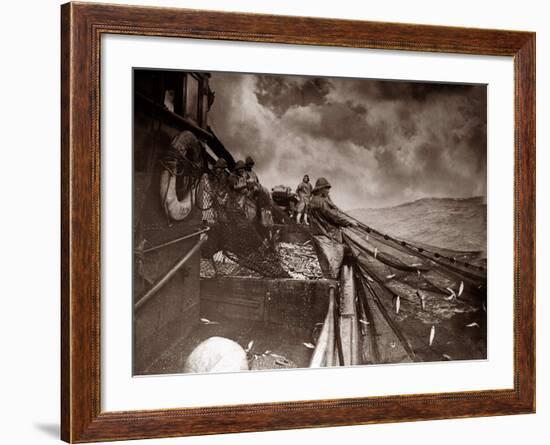 The Crew of a Yarmouth Herring Boat Pull in Their Catch on a Storm Tossed North Sea, 1935-null-Framed Photographic Print