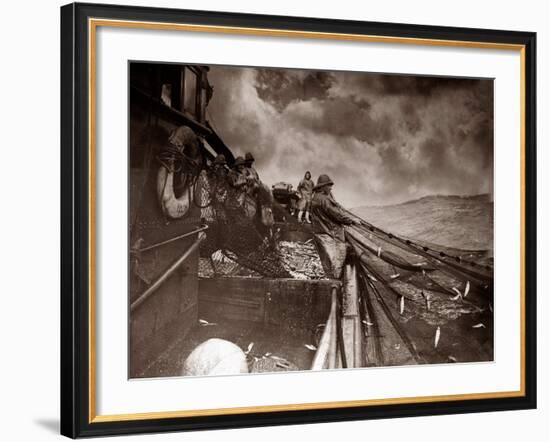 The Crew of a Yarmouth Herring Boat Pull in Their Catch on a Storm Tossed North Sea, 1935-null-Framed Photographic Print