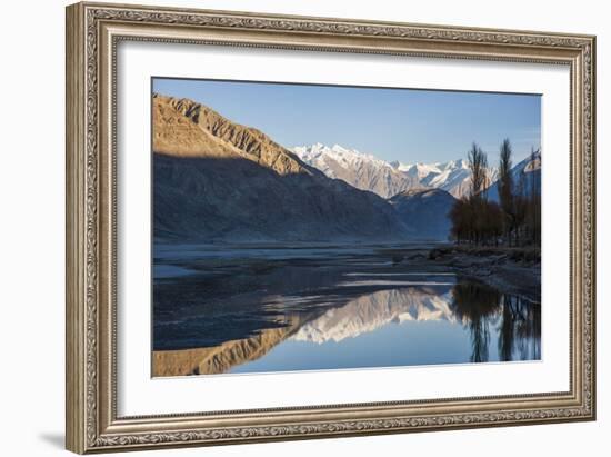 The crystal clear Shyok River creates a mirror image in the Khapalu valley near Skardu, Pakistan-Alex Treadway-Framed Photographic Print