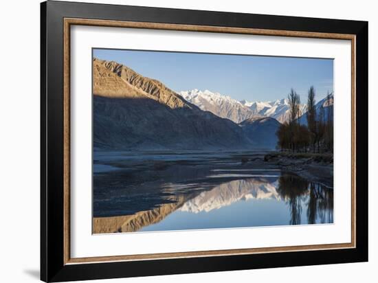 The crystal clear Shyok River creates a mirror image in the Khapalu valley near Skardu, Pakistan-Alex Treadway-Framed Photographic Print