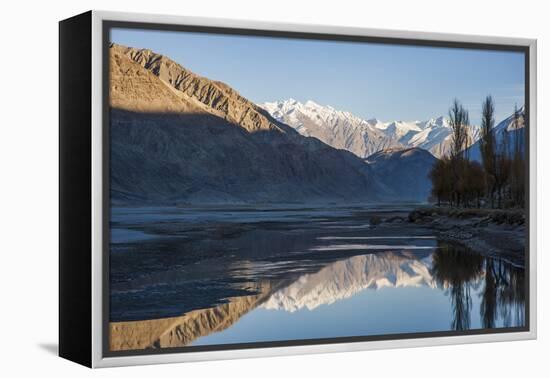 The crystal clear Shyok River creates a mirror image in the Khapalu valley near Skardu, Pakistan-Alex Treadway-Framed Premier Image Canvas